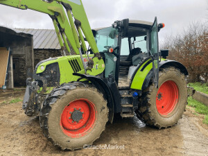 TRACTEUR ARION 460 Presse à balles rondes